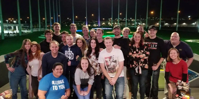 David Edward Garber in 2017 with his Funded Today co-workers and others at a company event.